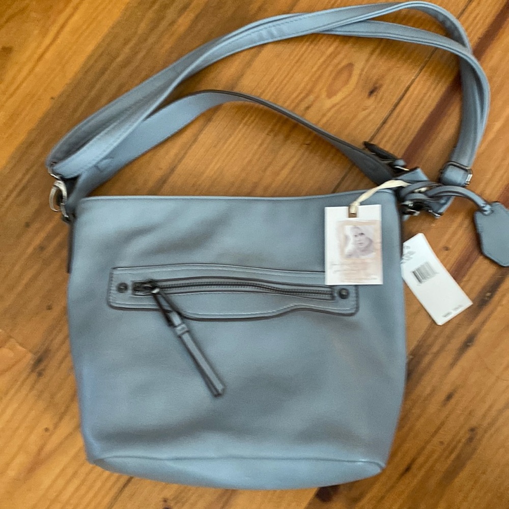 Ladies’ Jessica Simpson hobo style purse with adjustable straps,zip side pockets